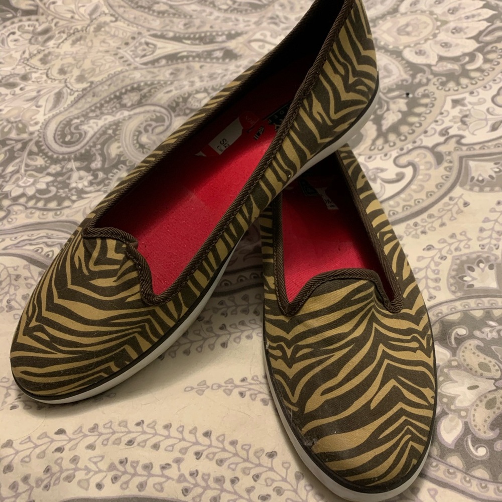 Sperry canvas animal print sneaker. 7